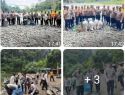 Polsek Padang Tualang Gotong Royong Bersihkan Ekowisata Tangkahan, Warga Apresiasi Kepedulian Polri